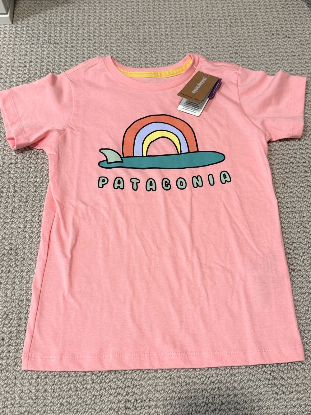 Patagonia Kids Organic Cotton Pink Graphic Tee with Surfing Rainbow